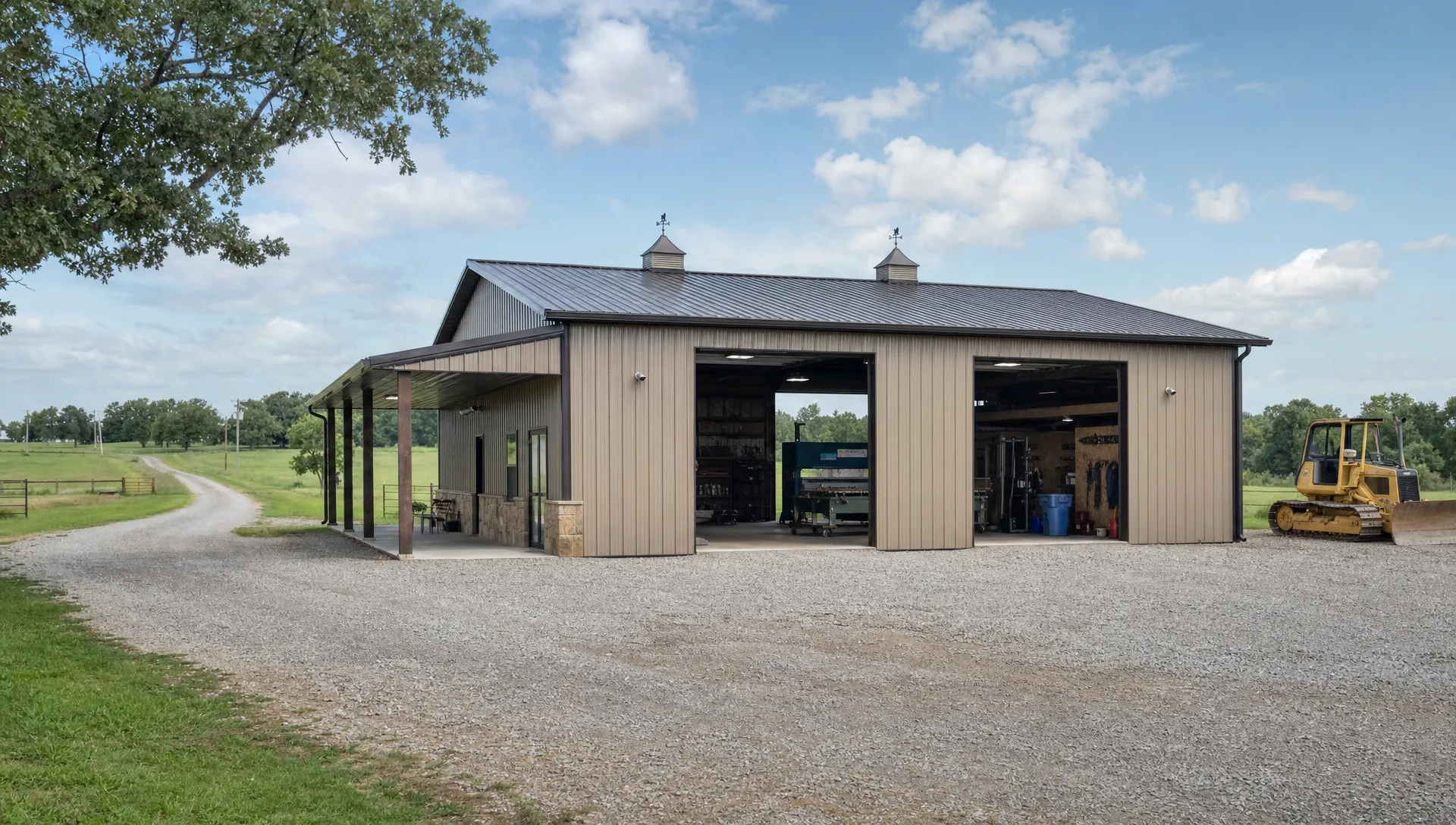 A custom metal shop building on rural Oklahoma land with wide overhead doors, a covered entry, equipment access, open gravel driveways and surrounding pasture.
